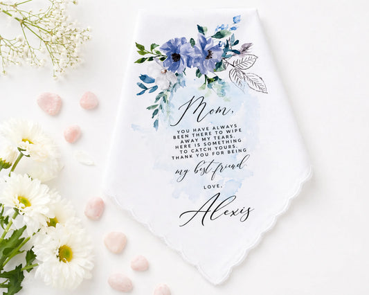 Floral hanky with a message to 'Mom' on a white background with flowers and pink stones.