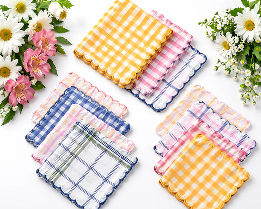 Set of colorful checkered coasters with flowers on a white background