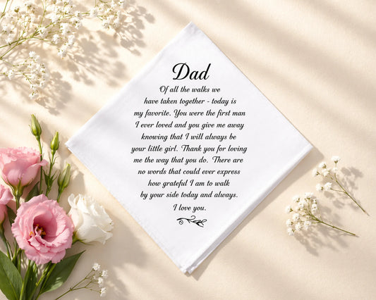 hanky with a heartfelt message to a father surrounded by flowers on a light background