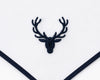 Embroidered deer head design on a white fabric with navy border