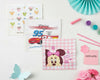 Pink and white checkered children’s handkerchief with a large cartoon mouse face and floral details