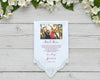 Lace Handkerchief with custom message surrounded by pink flowers on a light wooden surface