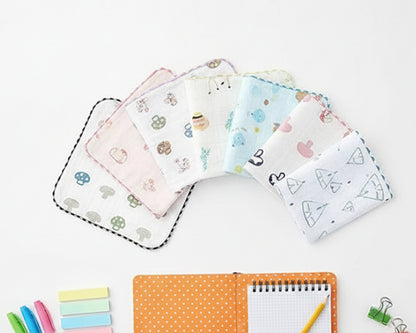 White baby muslin handkerchief with colorful mushroom and animal prints made in the usa
