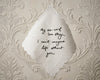 Decorative paper with a six-word love story on an ornate background