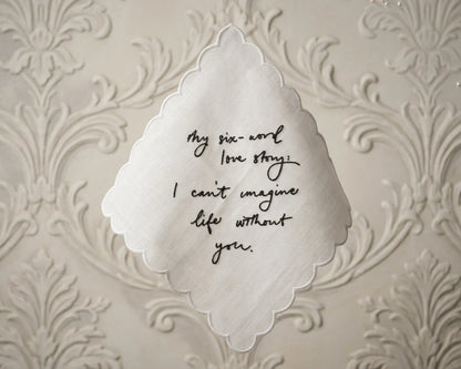 Decorative paper with a six-word love story on an ornate background