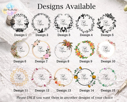 A promotional graphic showing 15 circular floral and ornamental frame designs labeled Design 1 through Design 15, with the text 'Designs Available' at the top and a note at the bottom saying to DM if they want them in any other designs of their choice. The frames include black, gold, pink, orange, green, and purple floral motifs on a textured white fabric background.