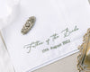 Embroidered handkerchief with 'Father of the Bride' text and date on a white background