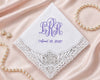 Embroidered handkerchief with monogram and date on a satin background