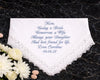 Embroidered handkerchief with personalized message on a dark textured background