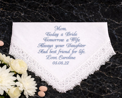 Embroidered handkerchief with personalized message on a dark textured background