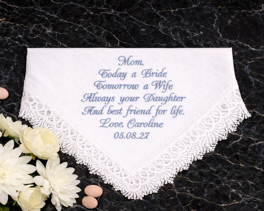 Embroidered handkerchief with personalized message on a dark textured background