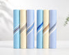 Five hanky products with blue and beige patterns on a white background