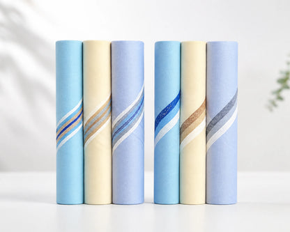 Five hanky products with blue and beige patterns on a white background