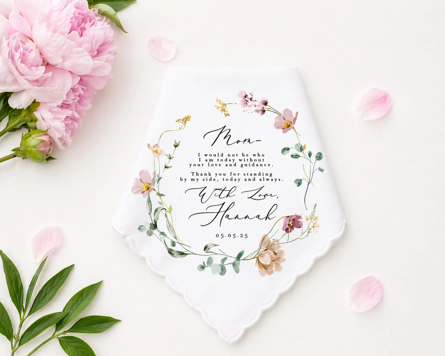 Floral hankie with personalized message on a white background with pink flowers.
