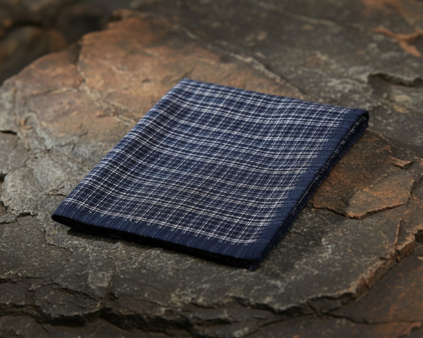 Folded_blue_plaid_handkerchief