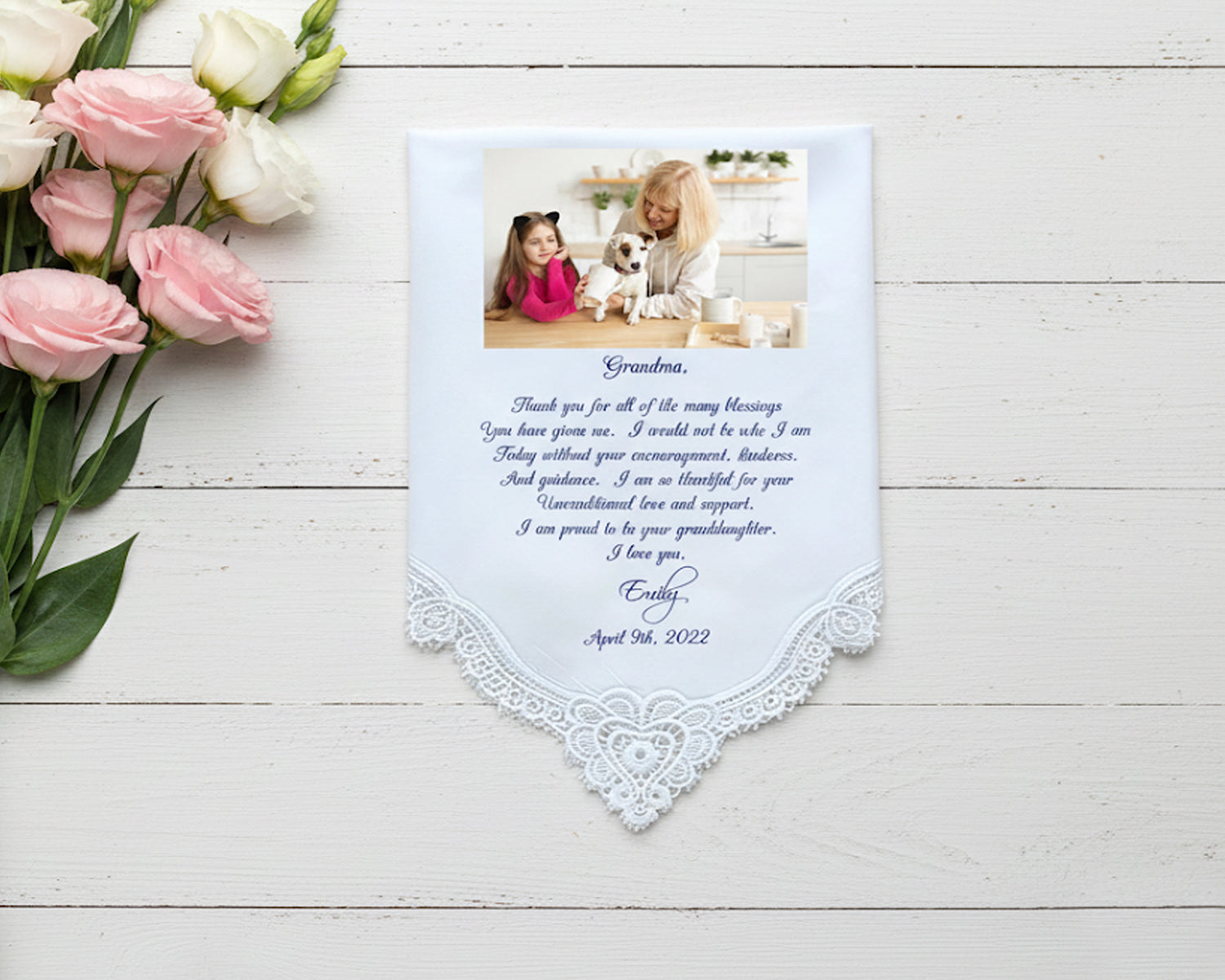 White lace edged handkerchief featuring a printed photo of two women and a message in a handwritten font from Mom to Brooke