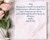 Hankie with embroidered message and pink roses on a marble surface