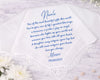 Hanky with personalized message from 'Mom' to 'Nicole' on a marble surface with flowers.