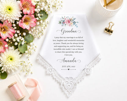 Letter to Grandma with flowers and stationery on a white surface