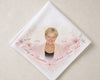 Memorial hanky with a photo of a woman, floral design, and text on a beige background