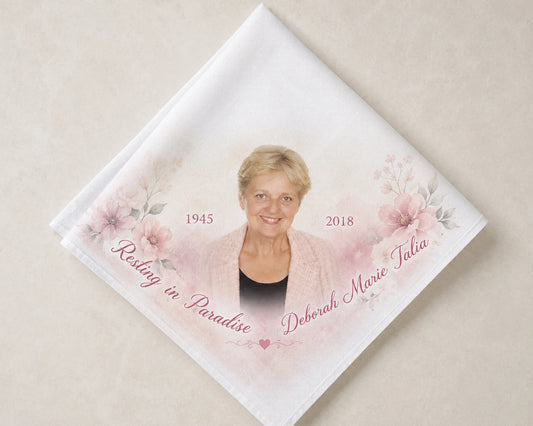 Memorial hanky with a photo of a woman, floral design, and text on a beige background