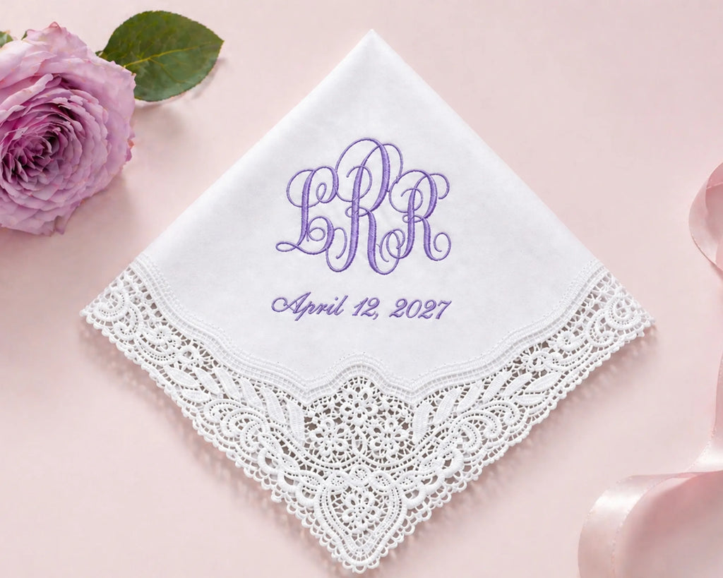 Monogrammed handkerchief with personalized text on a pink background with a rose.