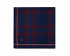 Navy and red checkered pocket square with a small logo on a white background