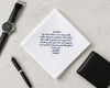 Notebook with a heartfelt message, pen, wallet, and watch on a light gray surface