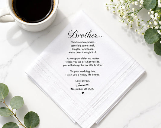 Open book with a heartfelt message to a brother, a cup of coffee, and flowers on a white surface.
