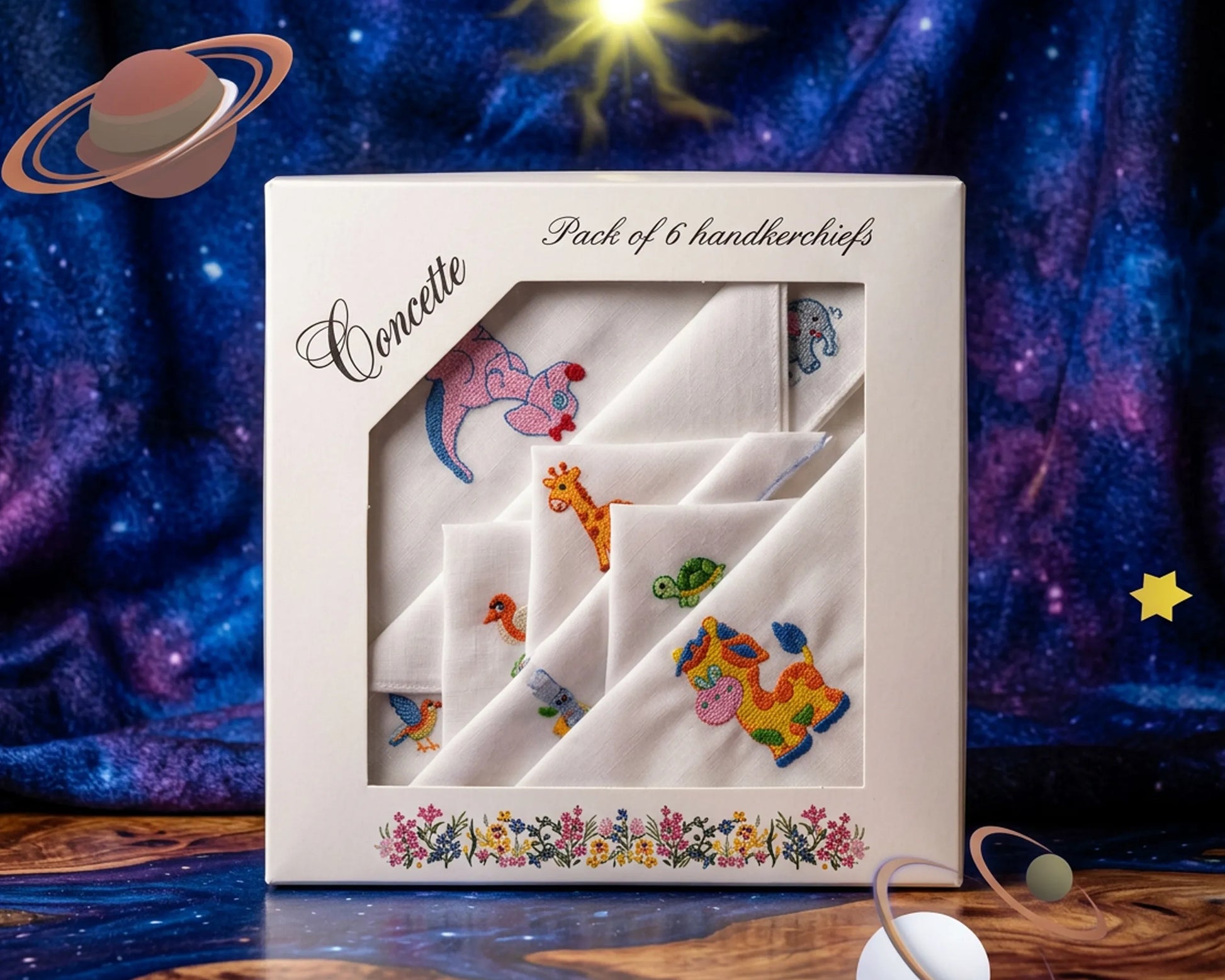 Pack of 6 handkerchiefs with animal designs in a decorative box against a space-themed background.
