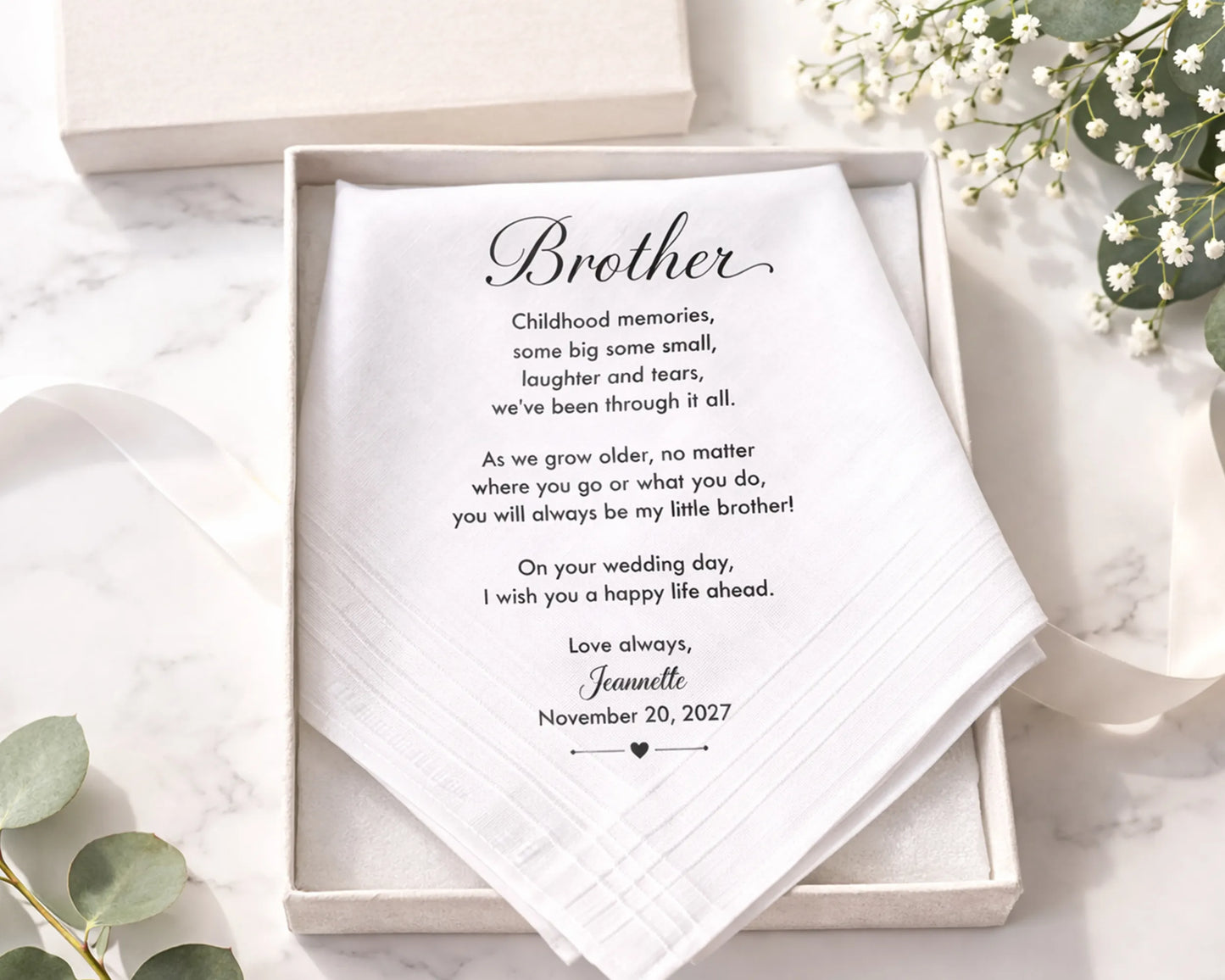 Personalized card for a brother on a wedding day, placed in an open box with decorative elements.
