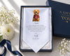 Personalized dog hanky with a message in a box, surrounded by flowers and ribbon.