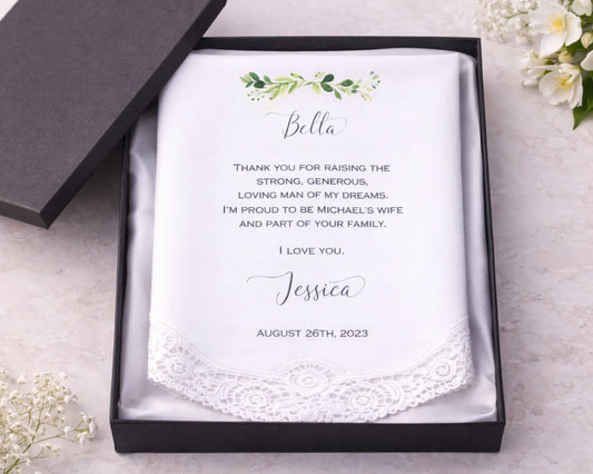 Personalized handkerchief in a black box with floral design and text.