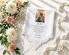 Personalized handkerchief with lace trim, photo, and text on a marble surface with flowers and ribbon.