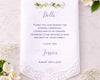 Personalized handkerchief with romantic message on a wooden surface with flowers
