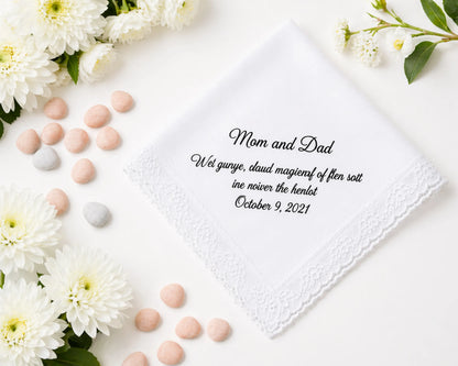 Personalized handkerchief with text print surrounded by flowers and candies on a white background