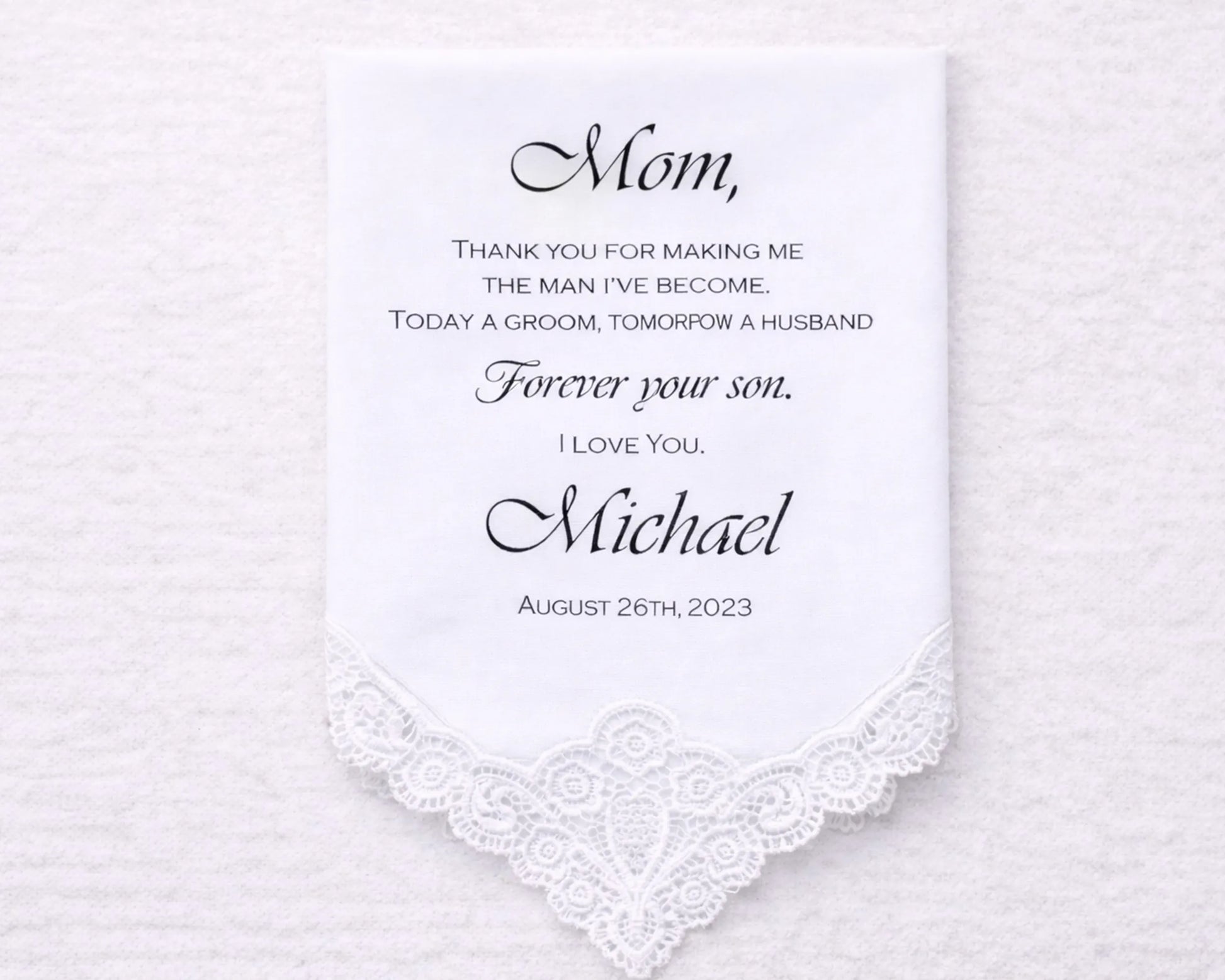 Personalized handkerchief with a message to 'Mom' on a white background