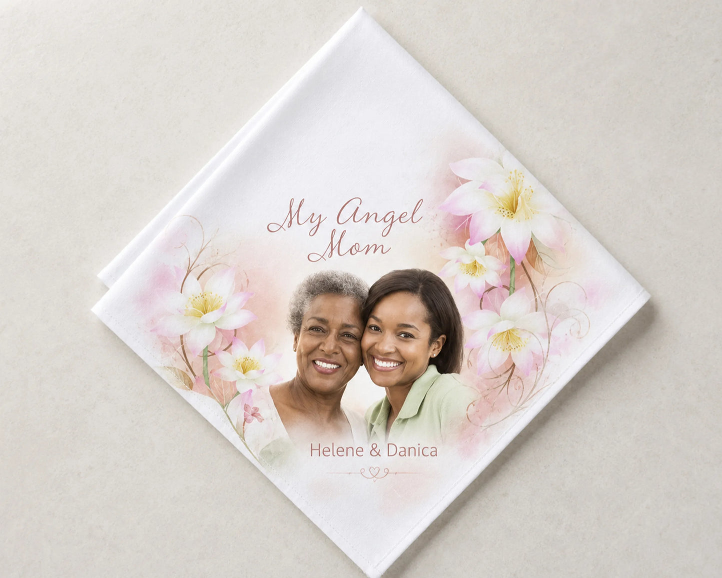 Personalized photo album with two women and floral design on a light background