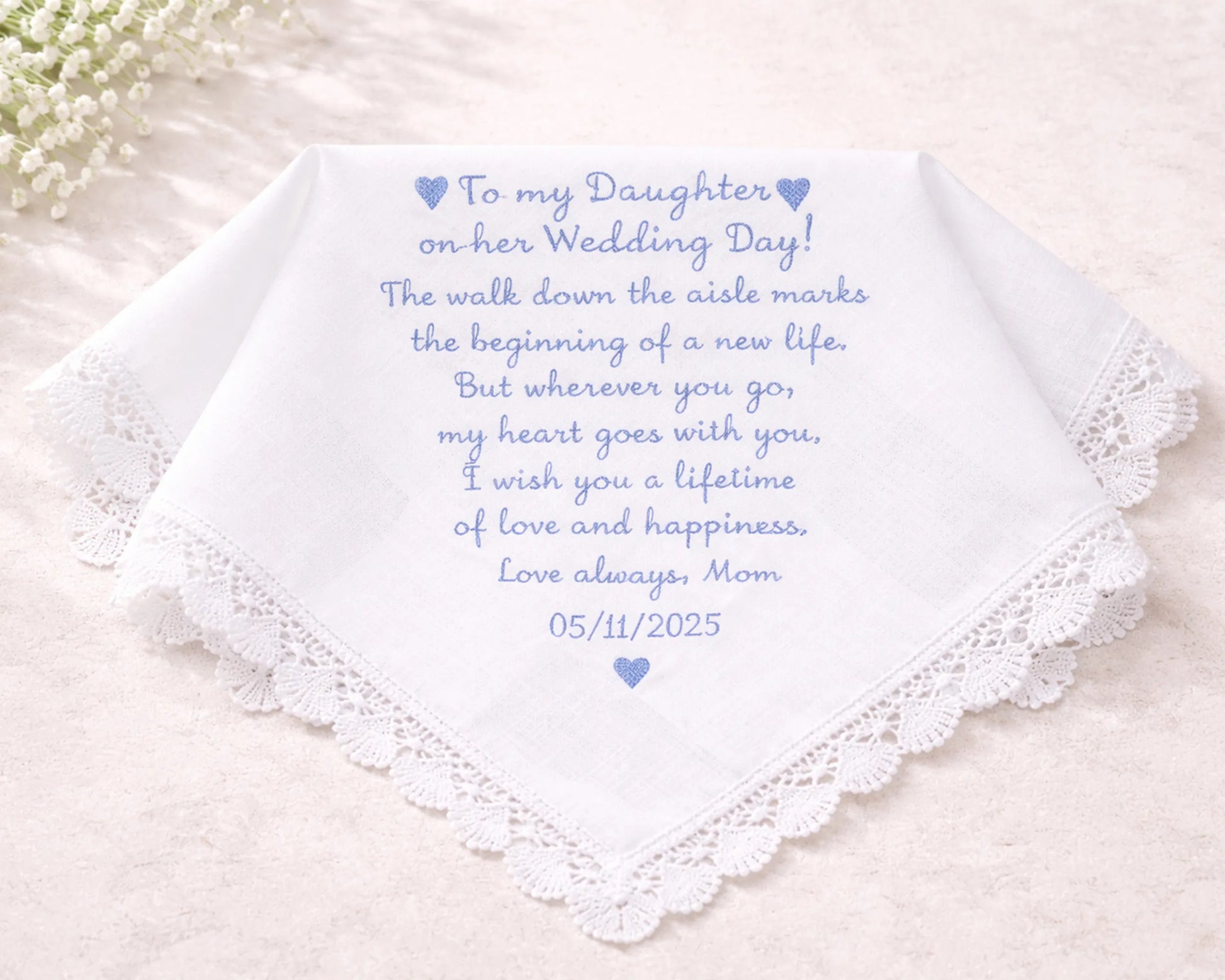 Personalized wedding handkerchief with a message to the daughter on a light background
