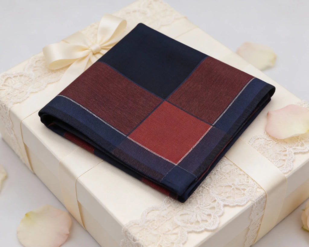 Plaid pocket square on a gift box with decorative elements