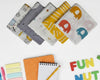 White kids cotton handkerchief with yellow elephant and lion illustrations made in the usa