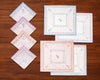 Set of baby blankets with patterns on a wooden surface