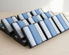 Set of blue and white checkered hanky on a wooden surface