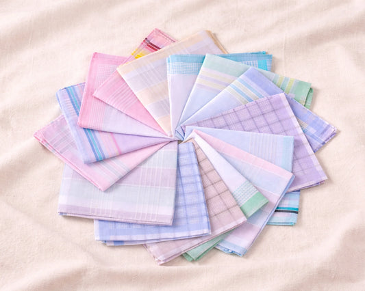 Set of colorful handkerchiefs arranged in a circular pattern on a beige background