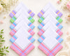 Set of colorful striped handkerchiefs on a light background with flowers and leaves.