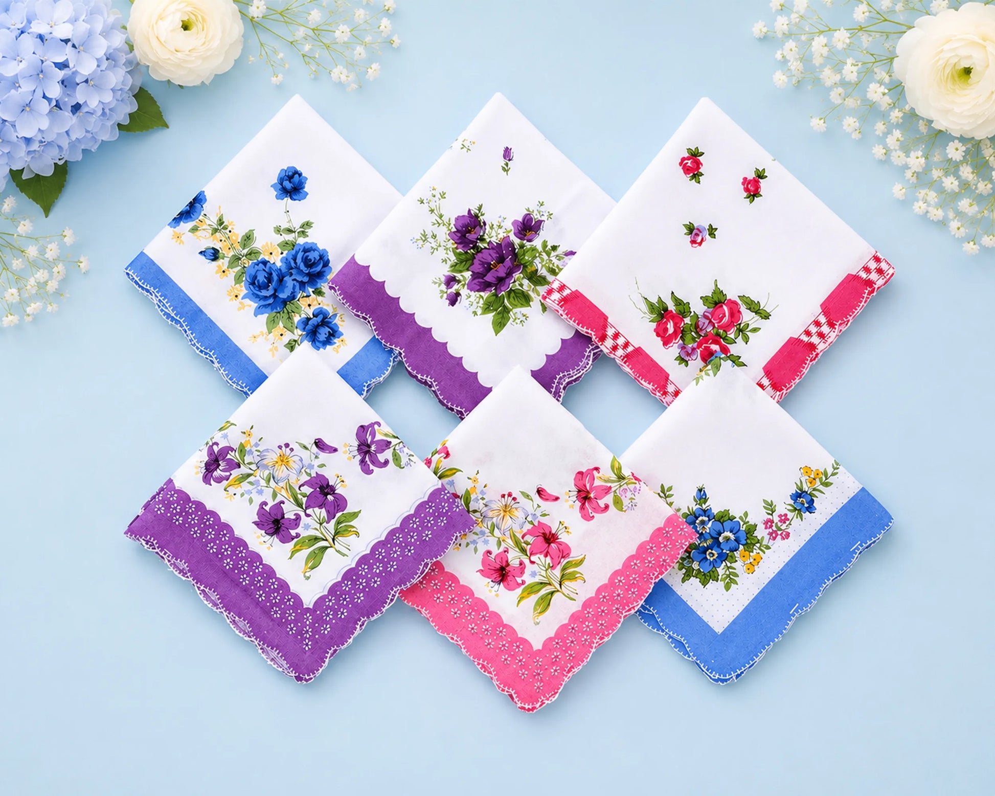 Set of floral handkerchiefs on a light blue background with flowers around