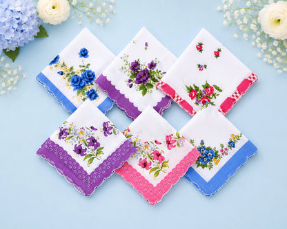 Set of floral handkerchiefs on a light blue background with flowers around