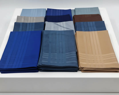 Set of folded handkerchief in various colors on a white background