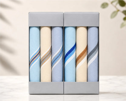 Set of folded hanky in a box with a neutral background