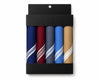 Set of folded hanky samples in various colors and patterns in a black packaging box.